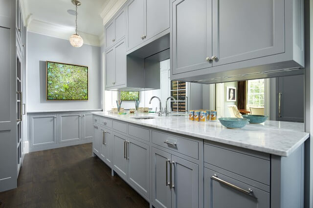 Grey kitchen cabinets with white countertops