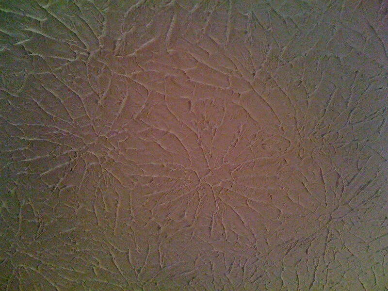 Rosebud Stomp drywall texture is common on ceilings throughout the Midwest United States. The name Rosebud refers to the look it creates of an opened rose flower with petals rolling out in a circular pattern from the center.