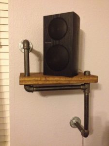 The other speaker stand made by husband and me. Black steel pipes, stained pine board.