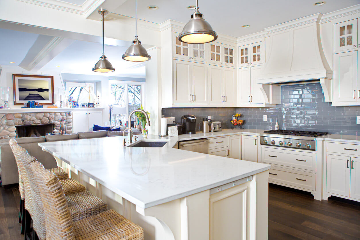 White-u-shaped-kitchen-with-blue-backsplash-nov22