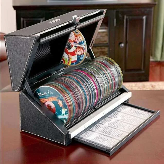 Store discs in stacked, labeled CD books storage ideas for dvd collection